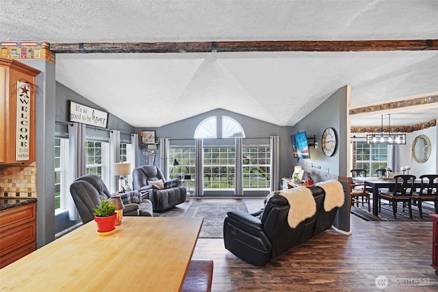 254 Macomber Rd, Chehalis, WA 98532 - living room with plenty of natural light, a textured ceiling, a notable chandelier, and dark wood finished floors