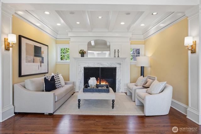 2720 W Galer St, Seattle, WA 98199 - living room with ornamental molding, a premium fireplace, beamed ceiling, baseboards, and wood finished floors