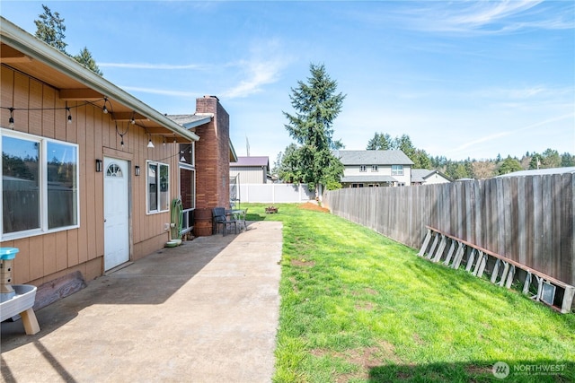 1658 N 2nd, Kelso, WA 98626 - view of yard featuring a fenced backyard and a patio area