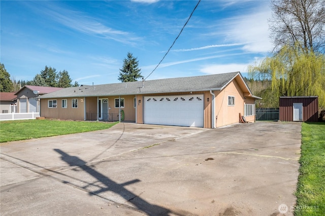 1658 N 2nd, Kelso, WA 98626 - ranch-style house with fence, driveway, a front yard, and an attached garage