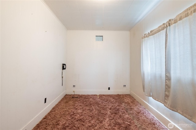 77 S Welcome Slough, Cathlamet, WA 98612 - empty room with baseboards, visible vents, ornamental molding, and carpet