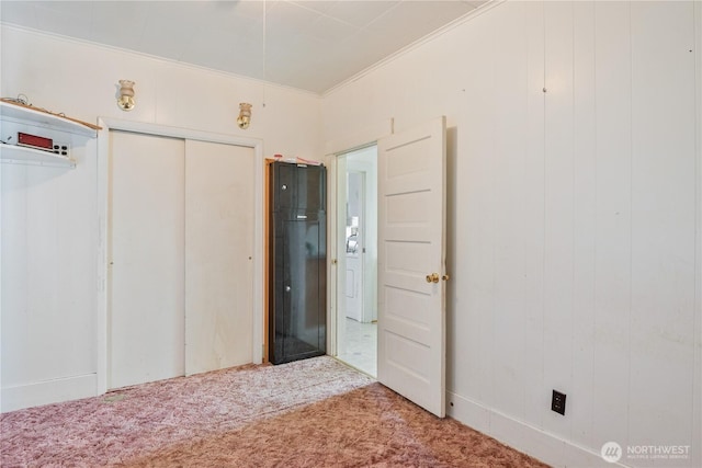 77 S Welcome Slough, Cathlamet, WA 98612 - unfurnished bedroom featuring crown molding and carpet