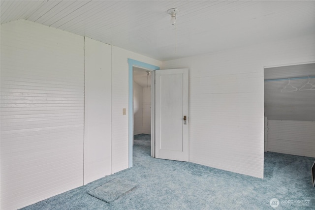 77 S Welcome Slough, Cathlamet, WA 98612 - unfurnished bedroom featuring lofted ceiling, a closet, and carpet