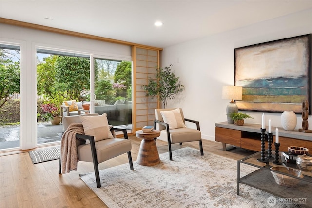 2501 Canterbury Ln E Unit 122, Seattle, WA 98112 - sitting room with wood finished floors and recessed lighting