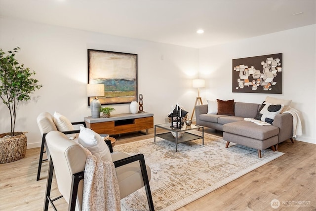 2501 Canterbury Ln E Unit 122, Seattle, WA 98112 - living room featuring light wood finished floors, baseboards, and recessed lighting