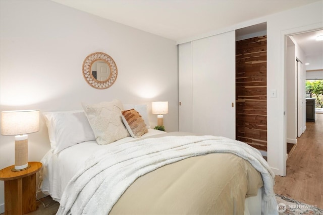 2501 Canterbury Ln E Unit 122, Seattle, WA 98112 - bedroom with a closet and wood finished floors