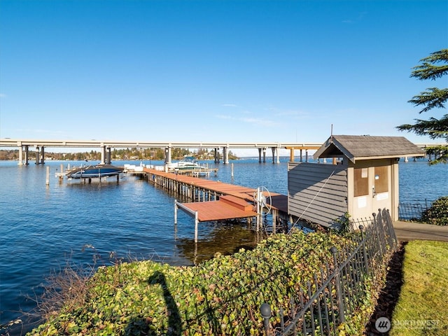 2501 Canterbury Ln E Unit 122, Seattle, WA 98112 - dock area featuring boat lift and a water view
