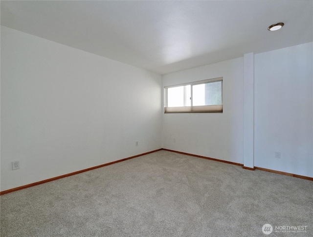 1156 Alki Ave SW Unit 204, Seattle, WA 98116 - carpeted spare room featuring baseboards