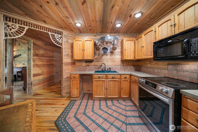9381 Olalla Cayon Rd, Cashmere, WA 98813 - kitchen with electric range, black microwave, a sink, wooden ceiling, and light countertops
