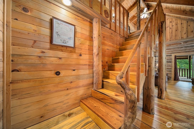 9381 Olalla Cayon Rd, Cashmere, WA 98813 - stairway featuring a sauna / steam room, wooden walls, hardwood / wood-style floors, and lofted ceiling