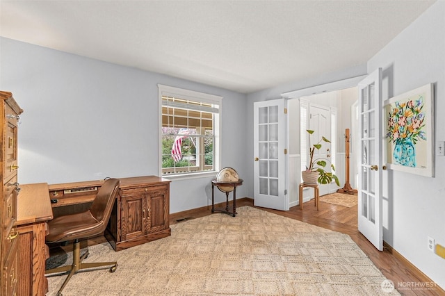 11312 134th Avenue Ct E, Puyallup, WA 98374 - office space with french doors, wood finished floors, and baseboards