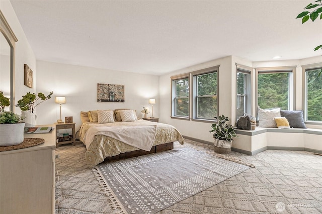 11312 134th Avenue Ct E, Puyallup, WA 98374 - carpeted bedroom featuring baseboards