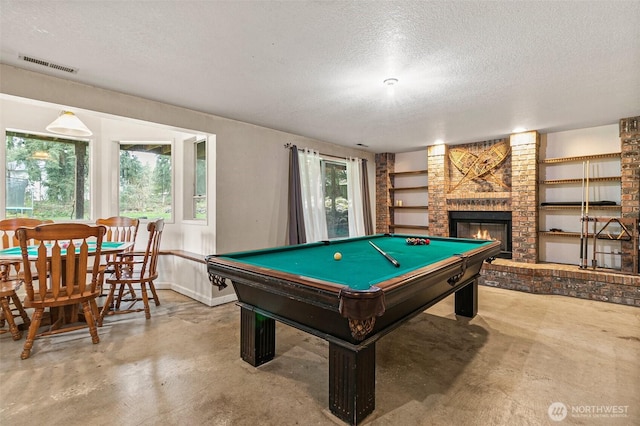 11312 134th Avenue Ct E, Puyallup, WA 98374 - game room with concrete flooring, visible vents, pool table, and a textured ceiling