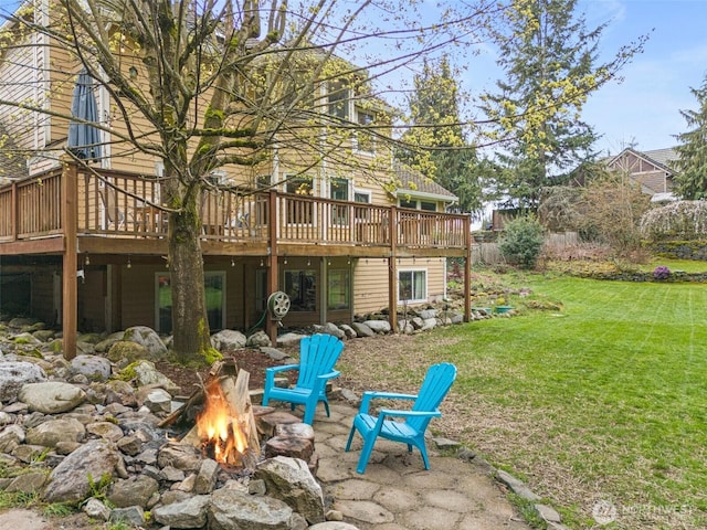 11312 134th Avenue Ct E, Puyallup, WA 98374 - rear view of property with an outdoor fire pit, a yard, and a wooden deck