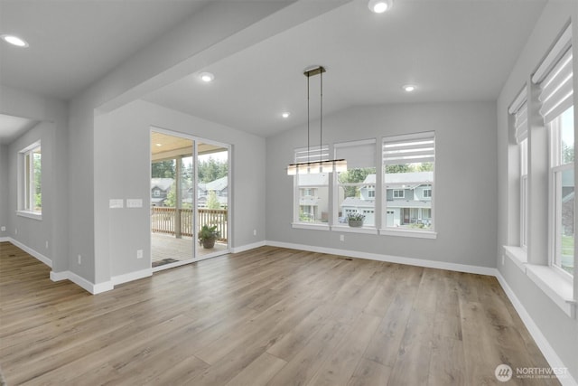 19504 141st Street Ct E, Bonney Lake, WA 98391 - unfurnished dining area with plenty of natural light, wood finished floors, vaulted ceiling, baseboards, and recessed lighting