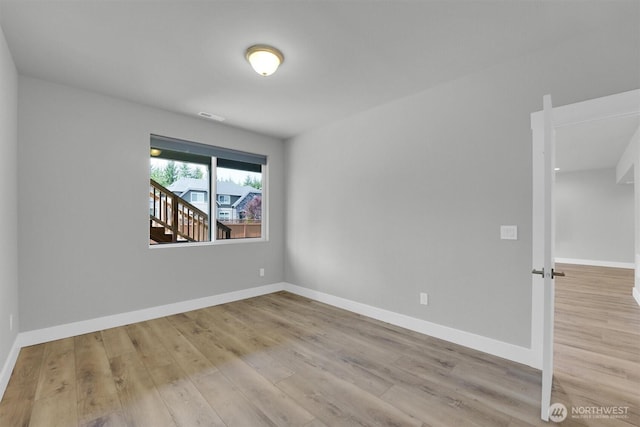 19504 141st Street Ct E, Bonney Lake, WA 98391 - unfurnished room with wood finished floors and baseboards