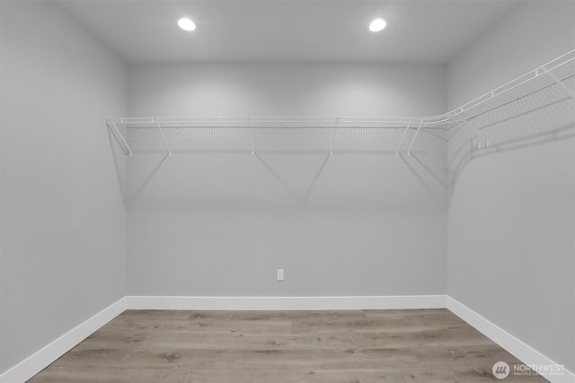 19504 141st Street Ct E, Bonney Lake, WA 98391 - walk in closet with light wood-style floors