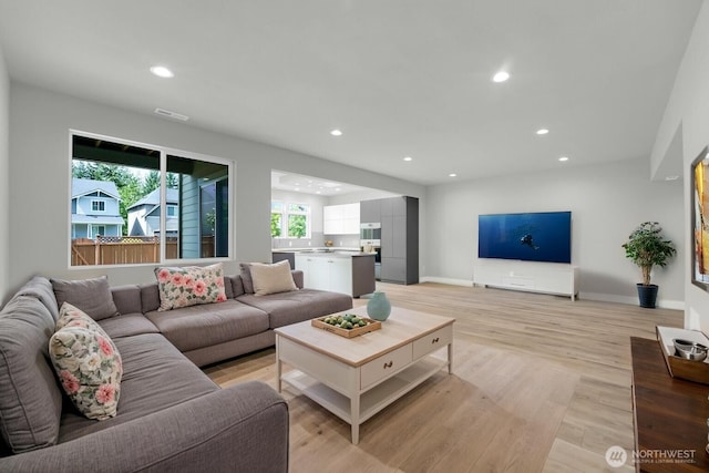 19504 141st Street Ct E, Bonney Lake, WA 98391 - living room with recessed lighting, light wood-type flooring, and baseboards