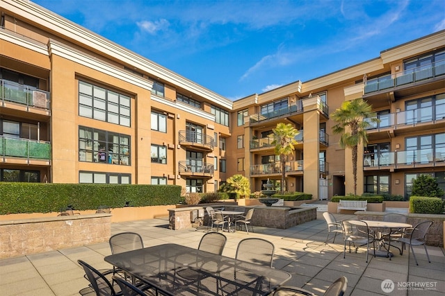 10047 Main St Unit 305, Bellevue, WA 98004 - surrounding community with outdoor dining area