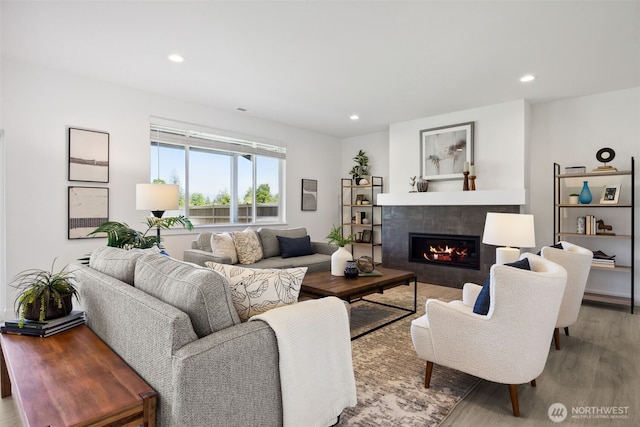 5842 229th Ave E, Buckley, WA 98321 - living area featuring a tile fireplace, wood finished floors, and recessed lighting