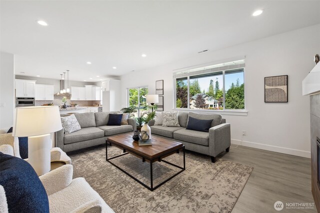 5842 229th Ave E, Buckley, WA 98321 - living room with recessed lighting and wood finished floors