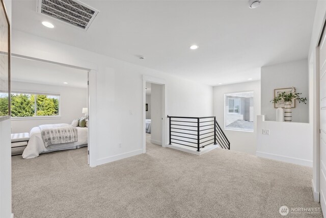 5842 229th Ave E, Buckley, WA 98321 - hallway featuring an upstairs landing, carpet flooring, and recessed lighting