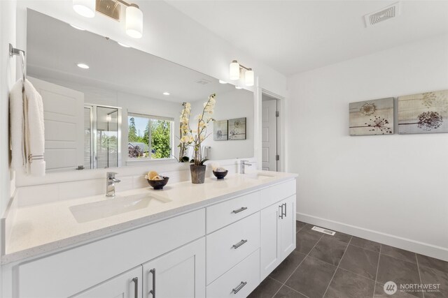 5842 229th Ave E, Buckley, WA 98321 - full bath with double vanity, a stall shower, recessed lighting, and tile patterned flooring