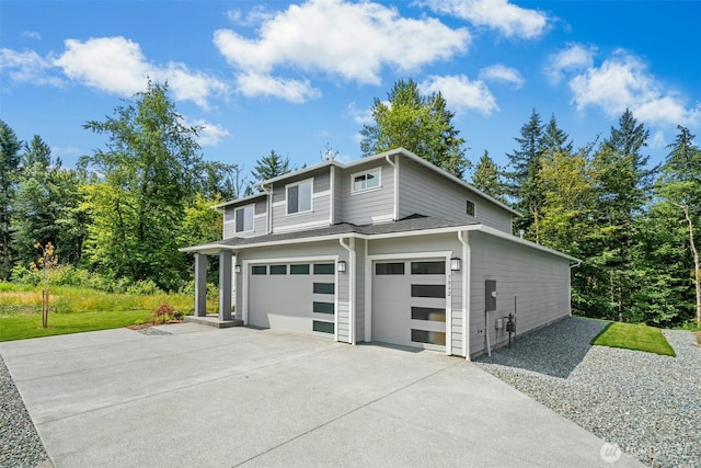 5842 229th Ave E, Buckley, WA 98321 - view of side of property with concrete driveway and an attached garage