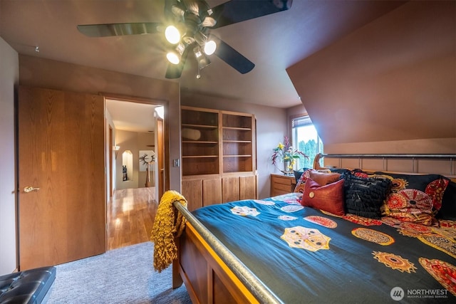 carpeted bedroom with ceiling fan