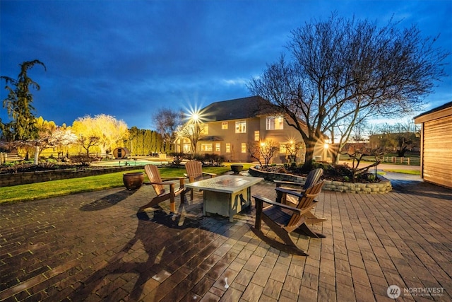 view of patio / terrace with a fire pit