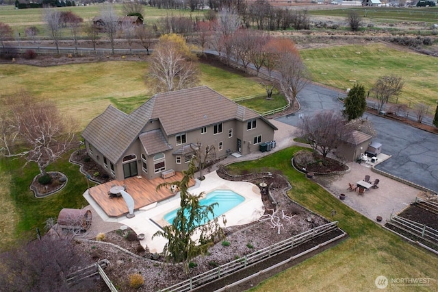 birds eye view of property with a rural view