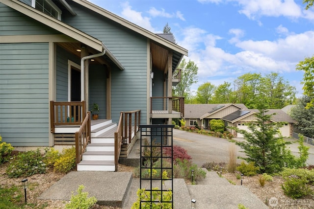 property entrance featuring driveway