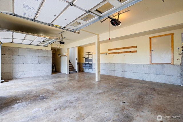 garage featuring a garage door opener