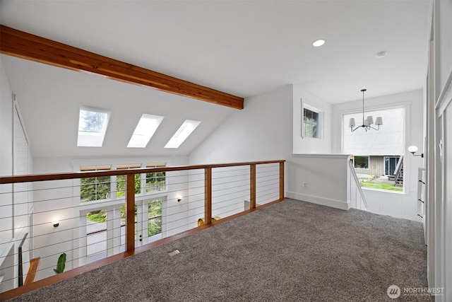 bonus room featuring carpet, vaulted ceiling with skylight, baseboards, a chandelier, and recessed lighting