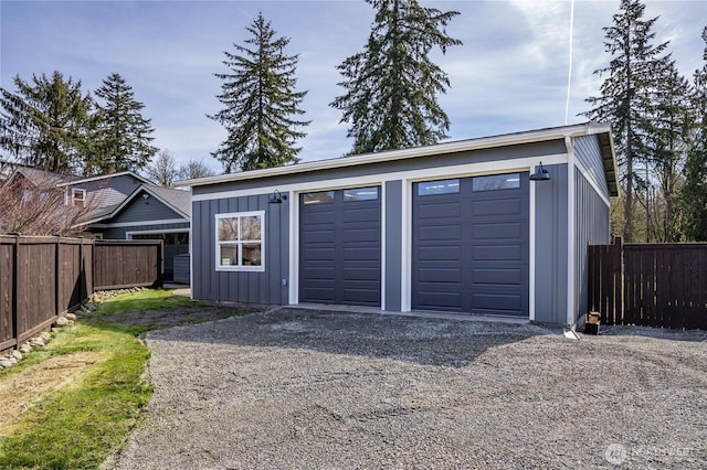 16005 SE Lake Holm Rd, Auburn, WA 98092 - garage featuring driveway and fence