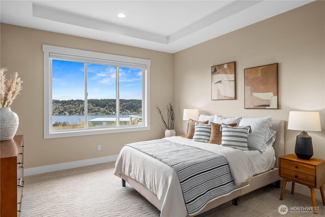 11230 SE 76th Pl, Newcastle, WA 98056 - carpeted bedroom featuring a raised ceiling, baseboards, and recessed lighting