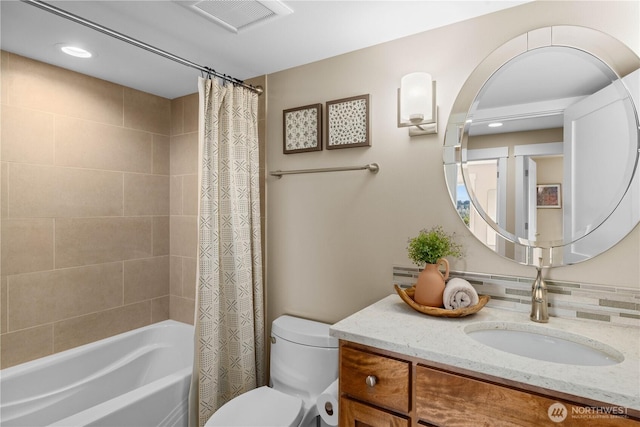 11230 SE 76th Pl, Newcastle, WA 98056 - bathroom featuring shower / bath combination with curtain, toilet, vanity, and visible vents