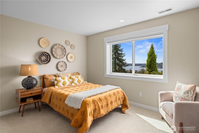 11230 SE 76th Pl, Newcastle, WA 98056 - bedroom with carpet flooring, baseboards, and visible vents