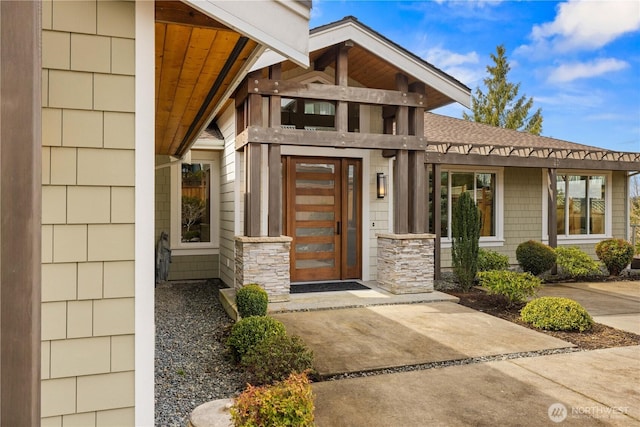 11230 SE 76th Pl, Newcastle, WA 98056 - view of exterior entry with roof with shingles