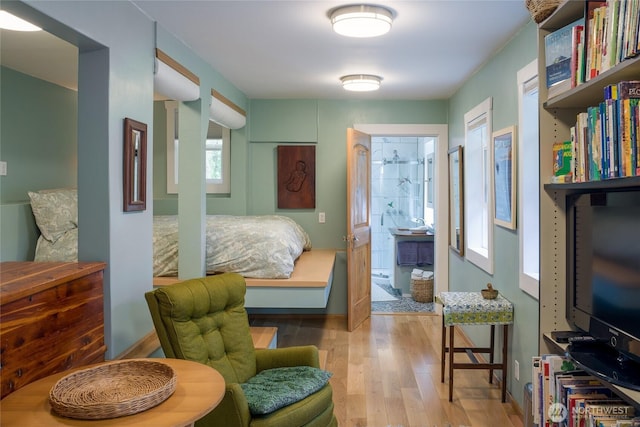 bedroom with wood finished floors