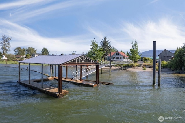 275 State Route 409, Cathlamet, WA 98612 - view of dock with boat lift and a water view