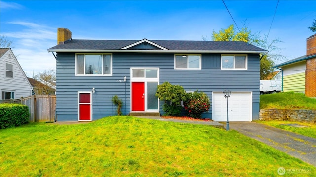13729 8th Ave S, Burien, WA 98168 - raised ranch with a chimney, aphalt driveway, fence, and a front yard