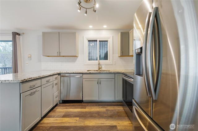 13729 8th Ave S, Burien, WA 98168 - kitchen featuring stainless steel appliances, a sink, and gray cabinets