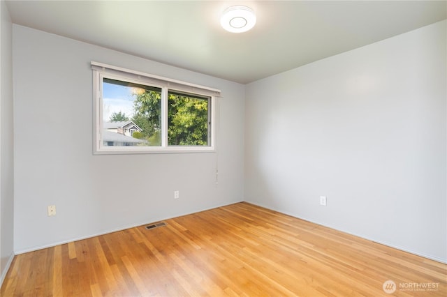 13729 8th Ave S, Burien, WA 98168 - unfurnished room with light wood finished floors and visible vents