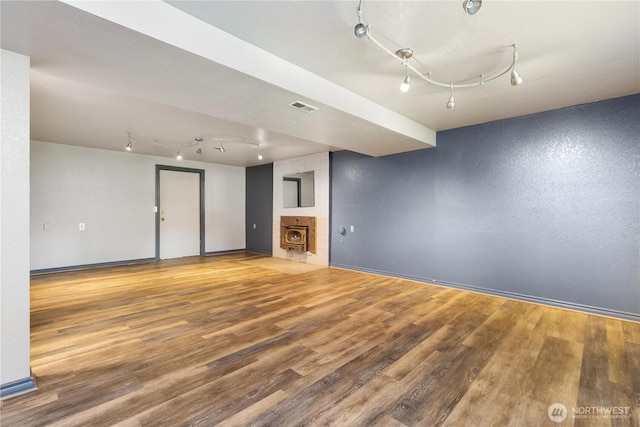 13729 8th Ave S, Burien, WA 98168 - unfurnished living room with visible vents, wood finished floors, and rail lighting