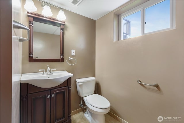 13729 8th Ave S, Burien, WA 98168 - bathroom featuring vanity, baseboards, toilet, tile patterned flooring, and visible vents