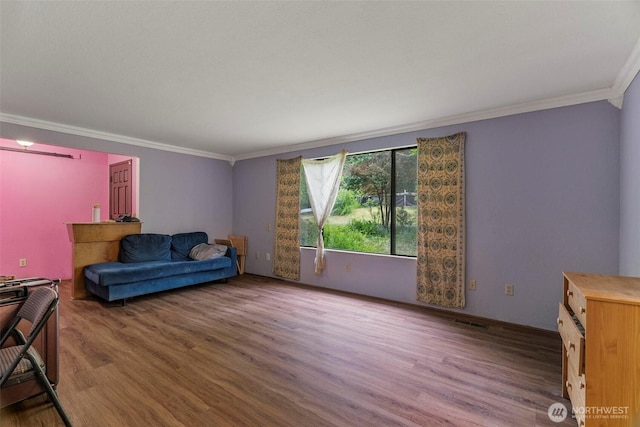 4901 Delta Ln SE, Tumwater, WA 98501 - living room featuring ornamental molding and wood finished floors