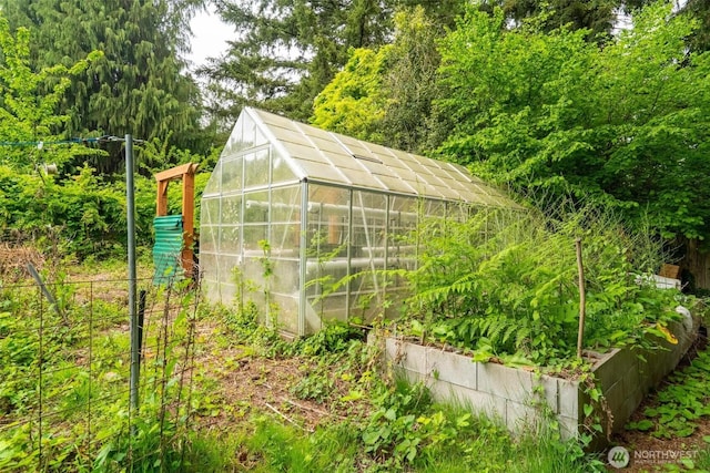 4901 Delta Ln SE, Tumwater, WA 98501 - view of greenhouse with a vegetable garden