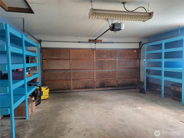 4901 Delta Ln SE, Tumwater, WA 98501 - garage featuring a garage door opener