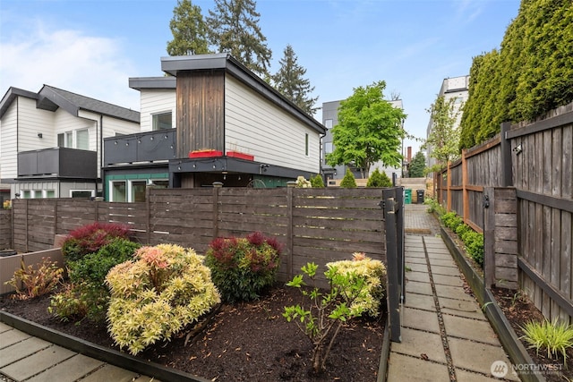 exterior space featuring a fenced backyard
